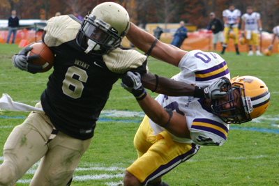 FOOTBALL DEFEATS ALBANY 24-7 BEHIND RECORD DAY BY BROWN AND RIFFE