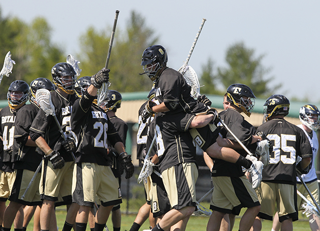 Bryant celebrates a 9-8 double-OT win over Mount St. Mary's to clinch first DI playoff berth